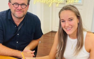 Merlin signing for her first mortgage!